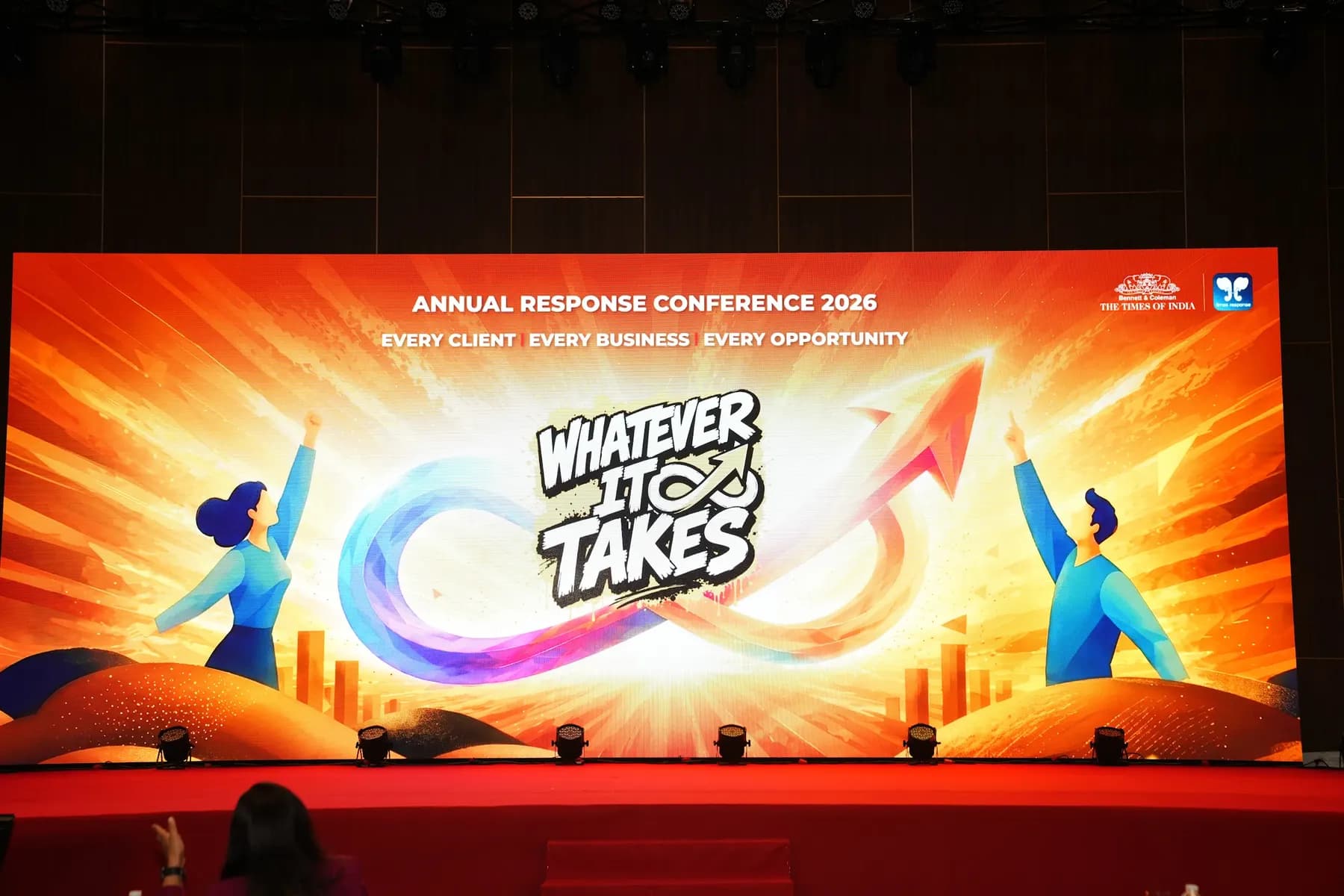 Full-width LED wall showing the event key visual